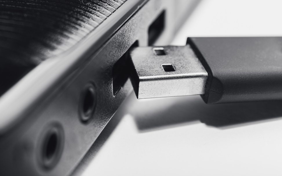 inserting usb pen drive on usb port of laptop